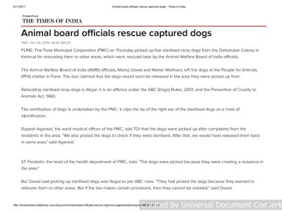 Animal-board-officials-rescue-captured-dogs-Times-of-India